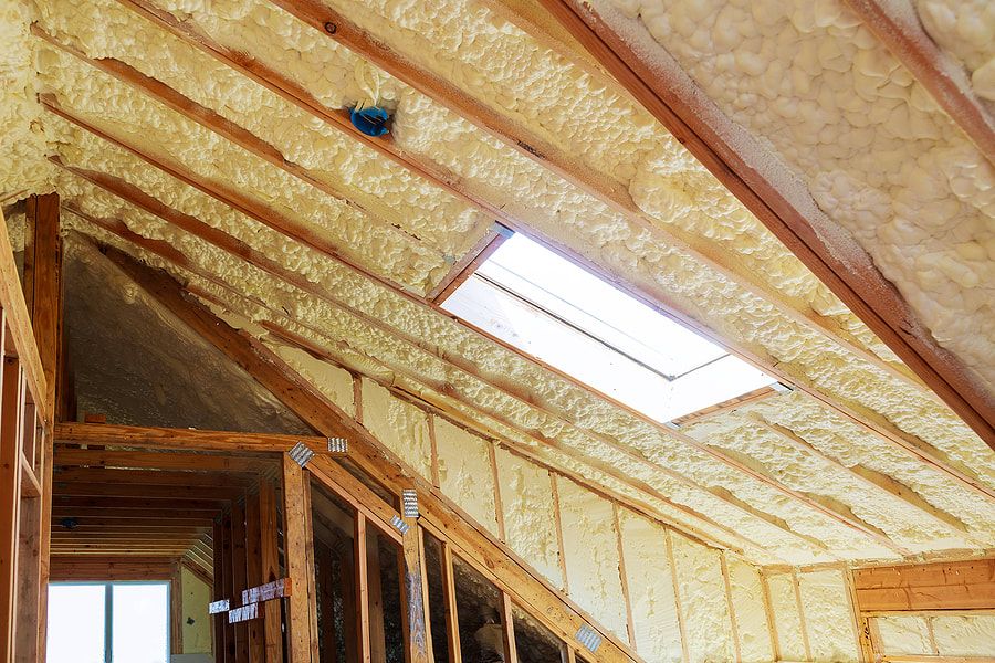 attic with insulation and windows